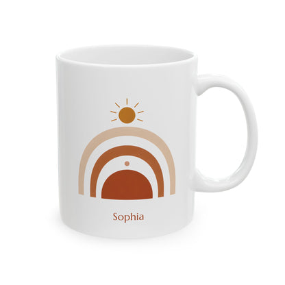 A white 11oz ceramic mug with a minimalist retro-style sunrise graphic in shades of tan, brown, and orange, featuring the name 'Sophia' printed below in brown. The mug is shown on a clean white background, right handle view.