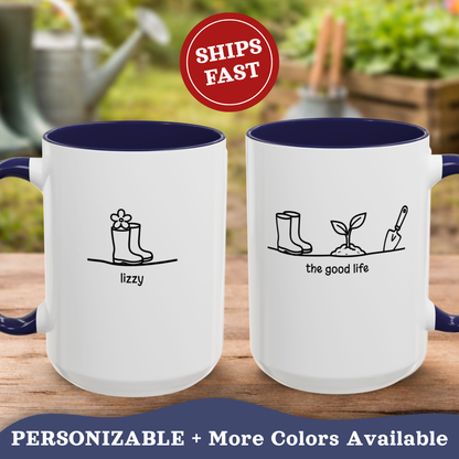 Two Good Life accent mugs with navy interiors on a wooden surface, personalized with names 'Lizzy' and matching design.