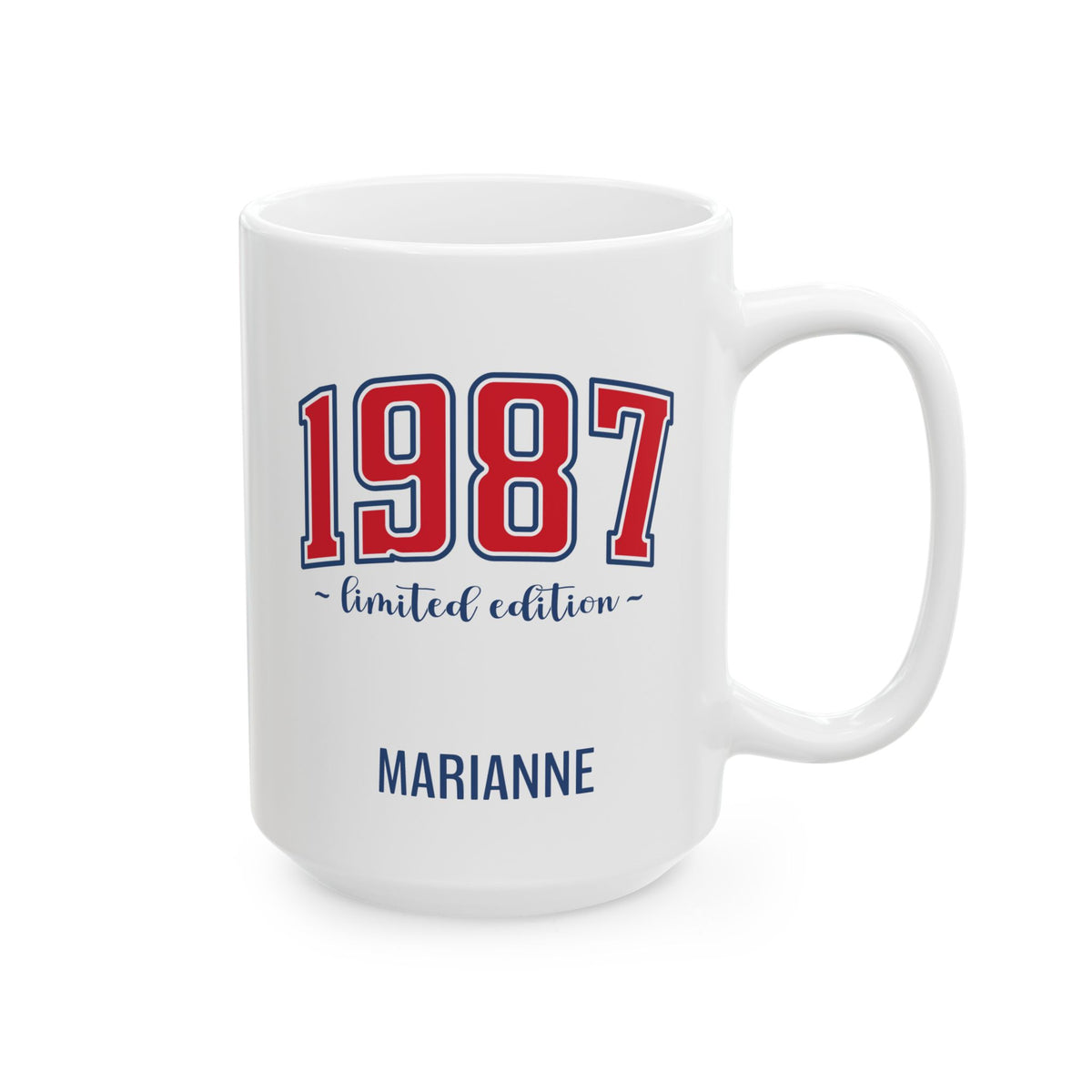 A white ceramic 15oz mug with a varsity design featuring the year '1987' in red with a blue outline, the phrase 'limited edition' in blue script, and the name 'MARIANNE' printed in blue at the bottom. Right handle view.