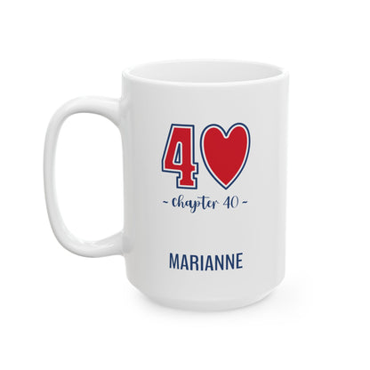 A white ceramic coffee 15oz mug with a red and blue '40 heart 40 chapter 40' graphic and the name 'MARIANNE' printed in blue, shown on a clean white background. Left handle view.