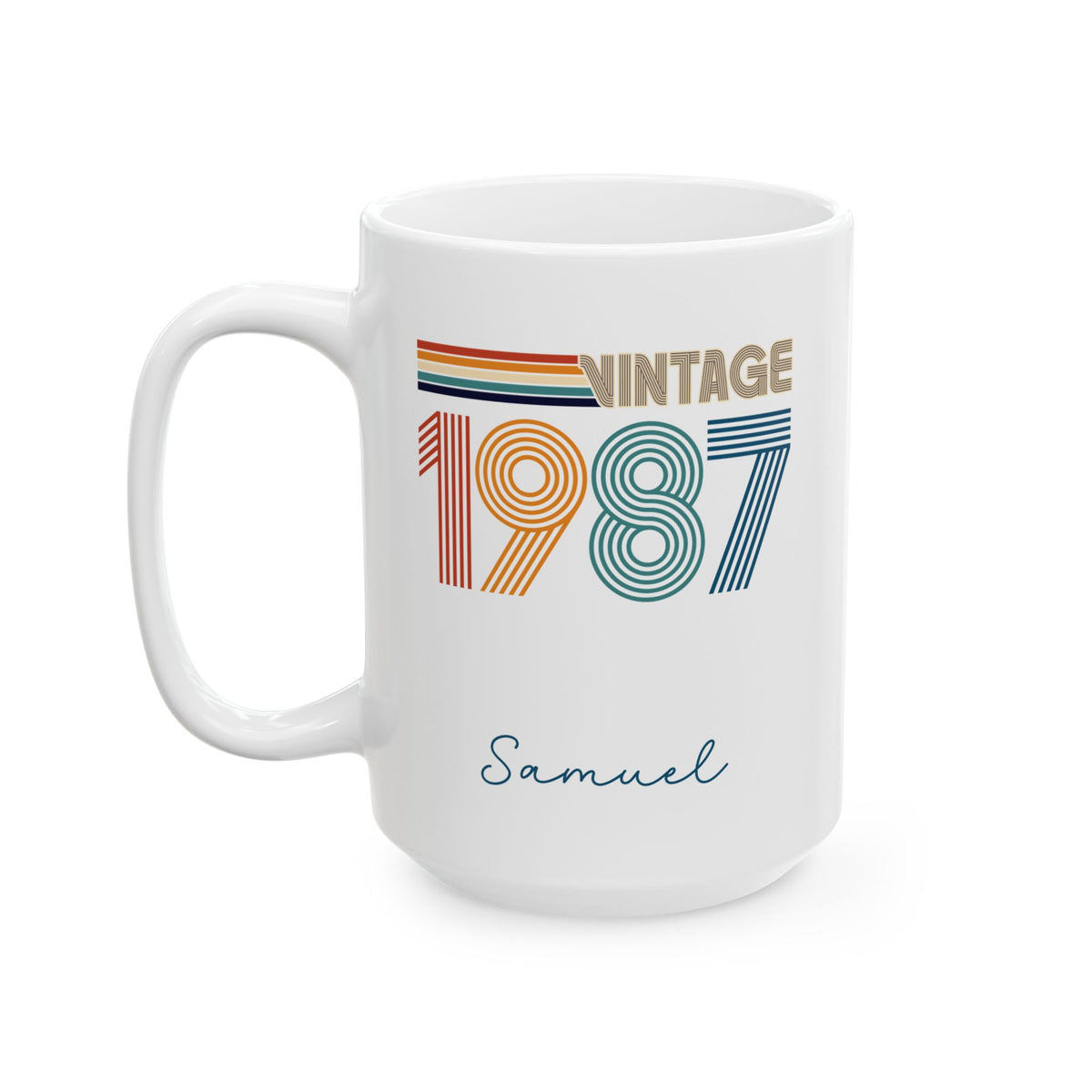 A white ceramic 15oz mug with a retro 1987 design, featuring the text 'VINTAGE 1987' in colorful striped numbers and the name 'Samuel' written in blue cursive below, shown on a plain white background. Left handle view.