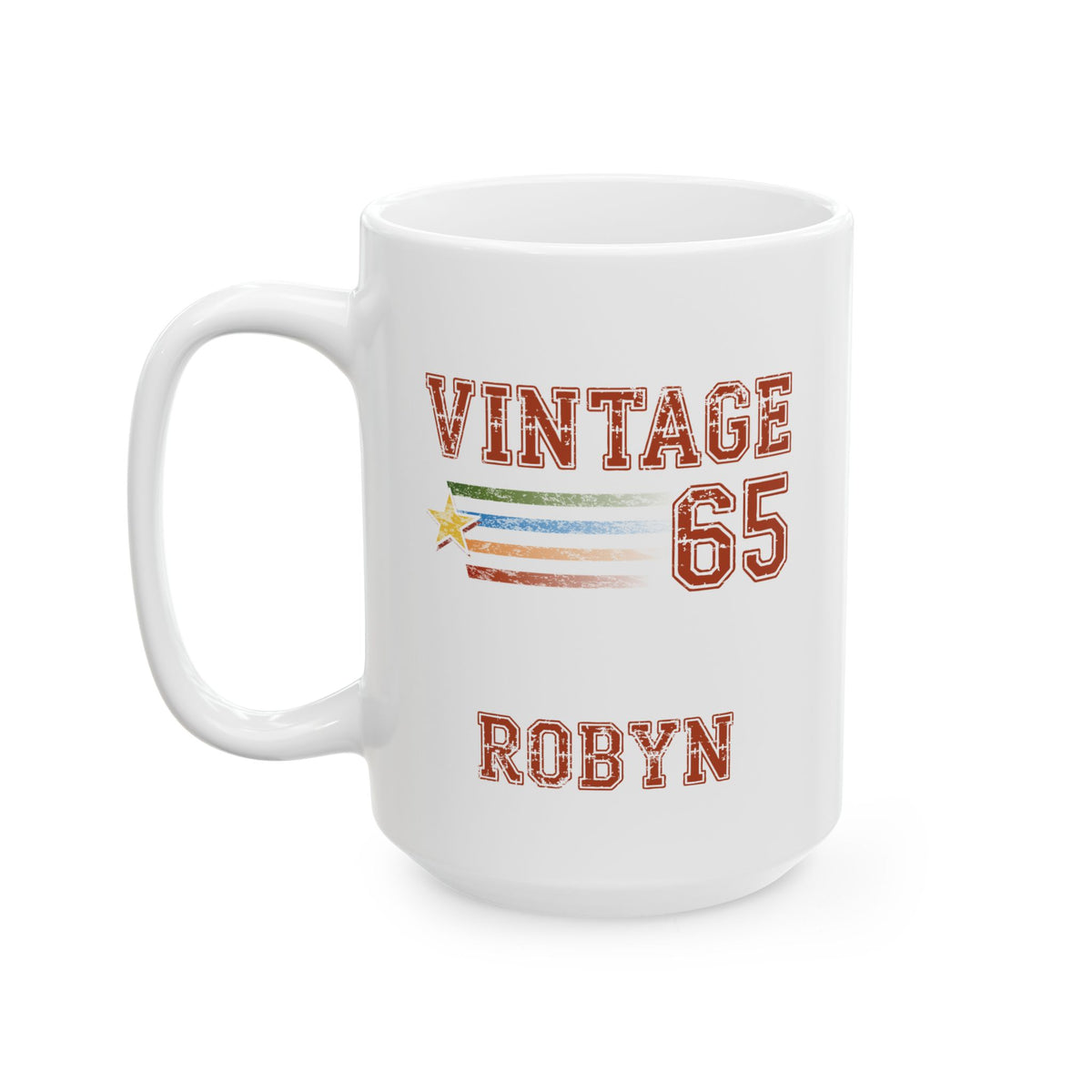 A white ceramic 15oz mug with a custom printed design featuring the text 'VINTAGE 65' and 'ROBYN' in a distressed red font, with a small retro flag graphic in the center. Left handle view.