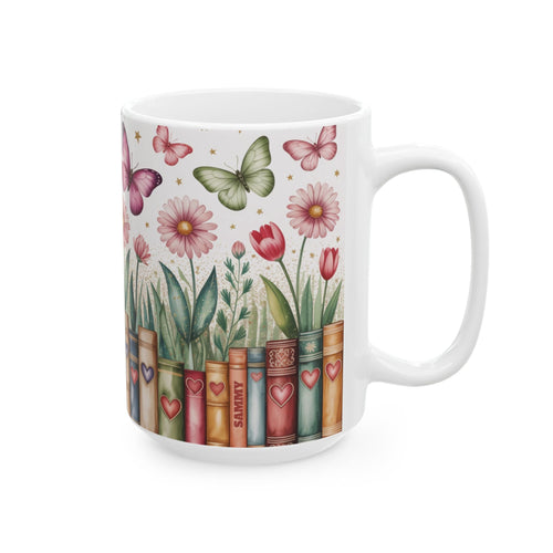 A white ceramic 15oz mug featuring a printed design of vintage book spines decorated with hearts, with flowers and butterflies growing out of them, on a white background. A subtle personalizable name on one of the book spines. Right handle view.